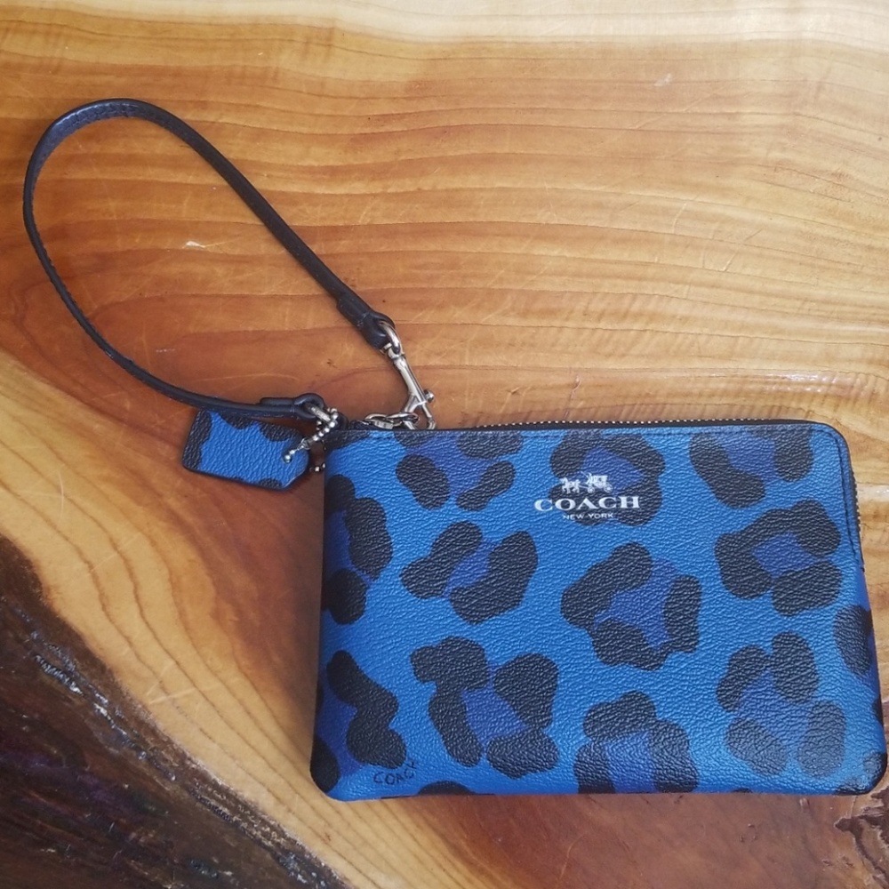 Coach wristlet cheetah print.